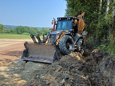 Traktorbagr Case 695ST 9 tun